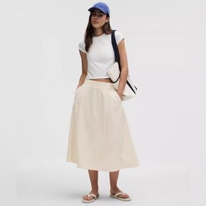 Lululemon stretch woven ruffle waist midi skirt light ivory Nwt size small